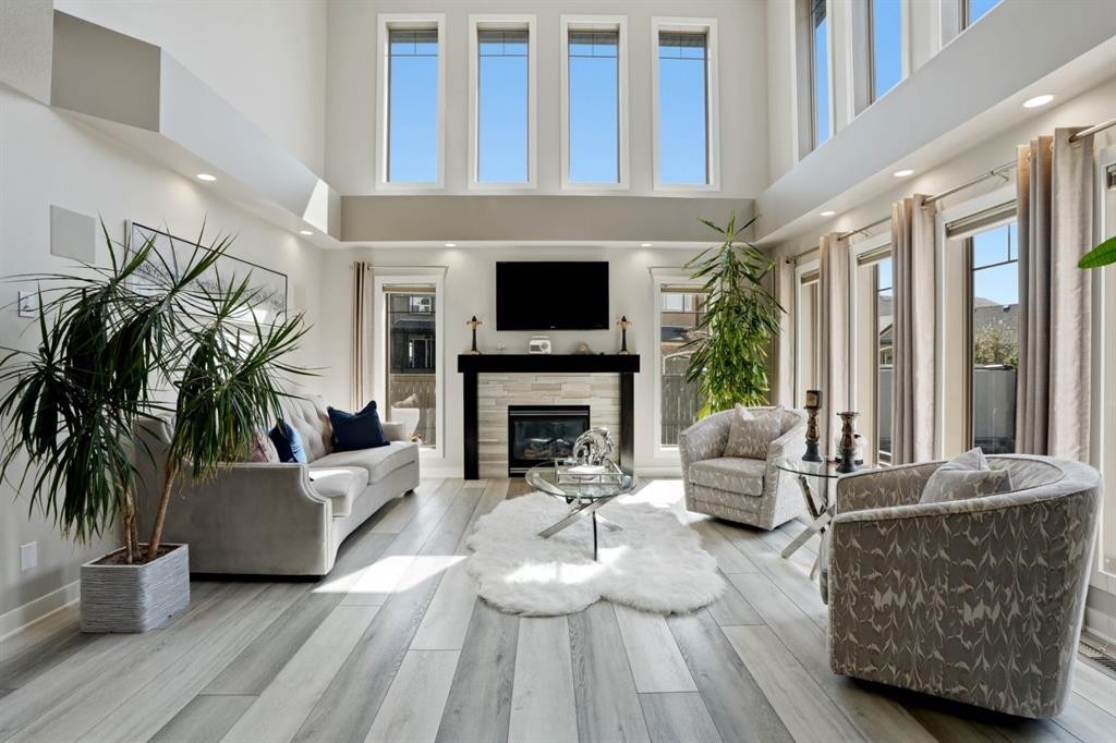 105 Cranridge Heights Se, Calgary, AB - Indoor Photo Showing Living Room With Fireplace