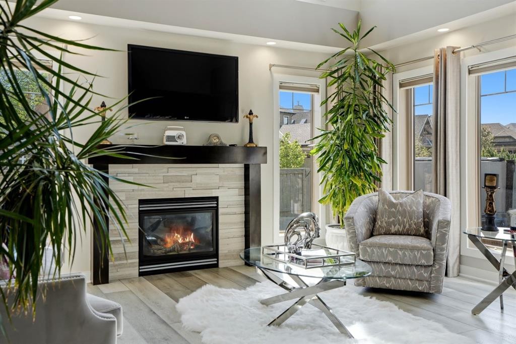 105 Cranridge Heights Se, Calgary, AB - Indoor Photo Showing Living Room With Fireplace