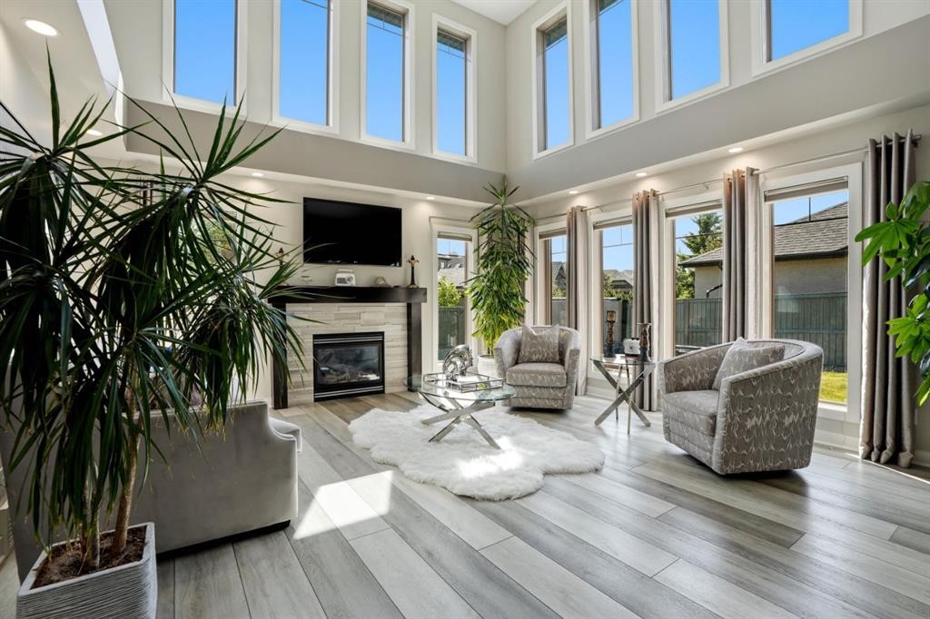105 Cranridge Heights Se, Calgary, AB - Indoor Photo Showing Living Room With Fireplace