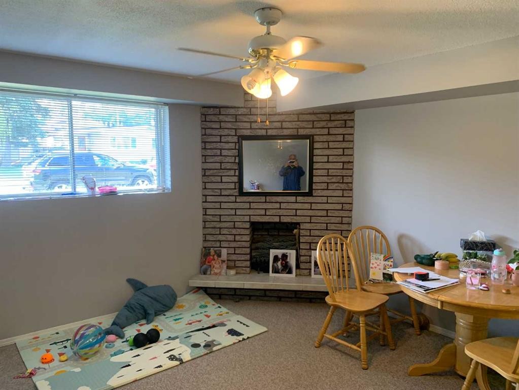 622 54 Avenue Sw, Calgary, AB - Indoor With Fireplace