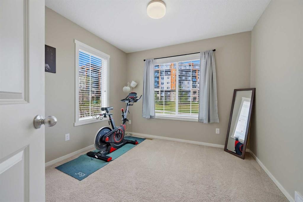 39 Kinlea Common Nw, Calgary, AB - Indoor Photo Showing Gym Room