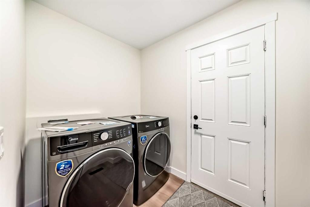 936 Cranston Drive Se, Calgary, AB - Indoor Photo Showing Laundry Room
