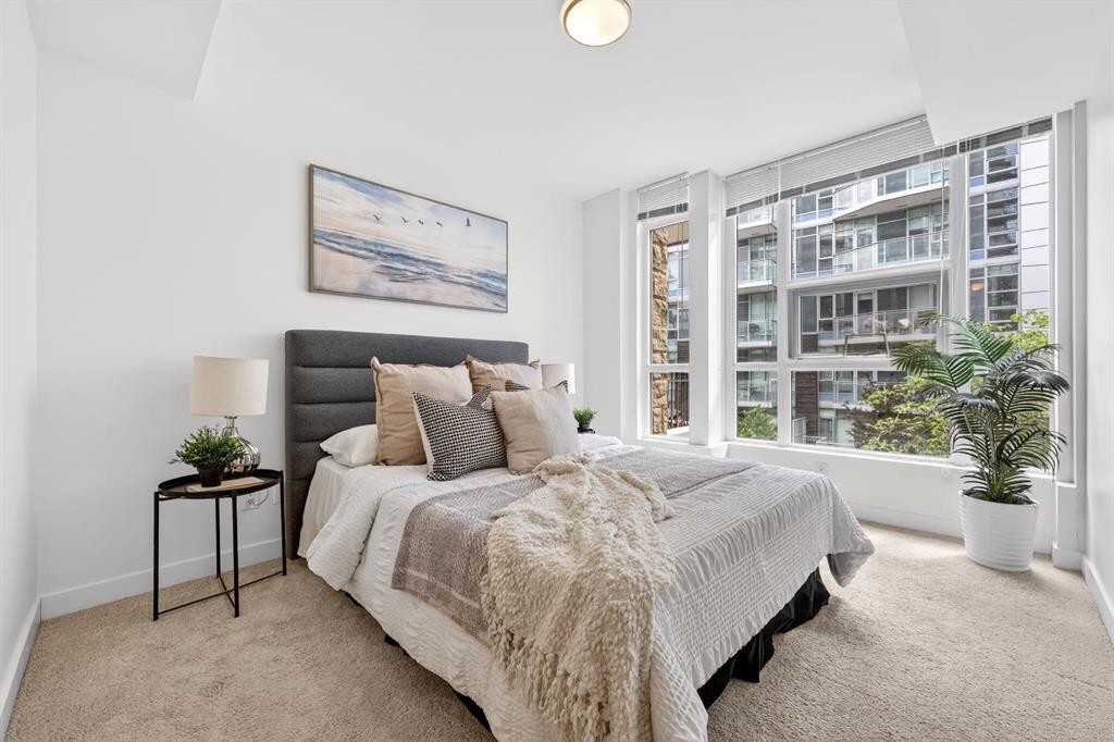 47 Waterfront Mews Sw, Calgary, AB - Indoor Photo Showing Bedroom