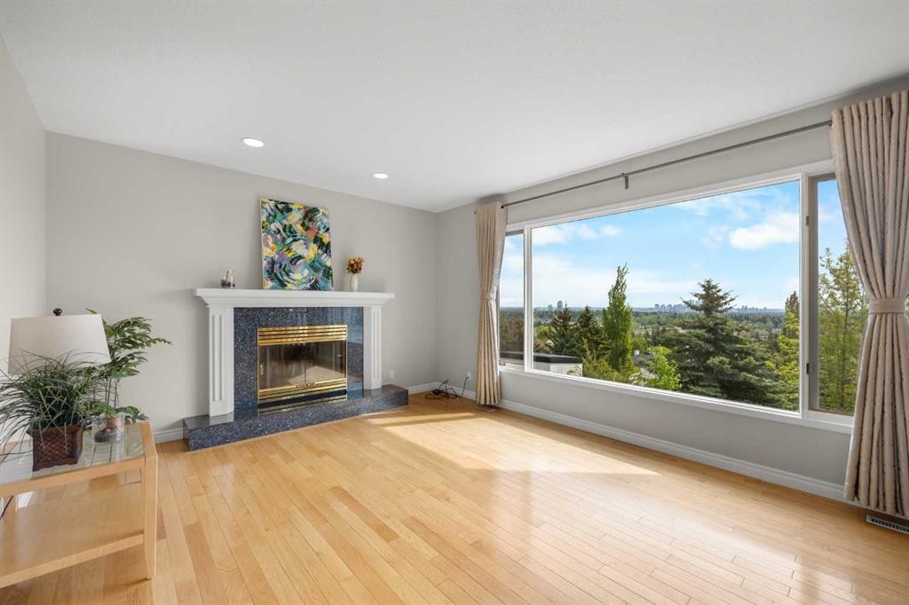 2740 Signal Ridge View Sw, Calgary, AB - Indoor Photo Showing Living Room With Fireplace