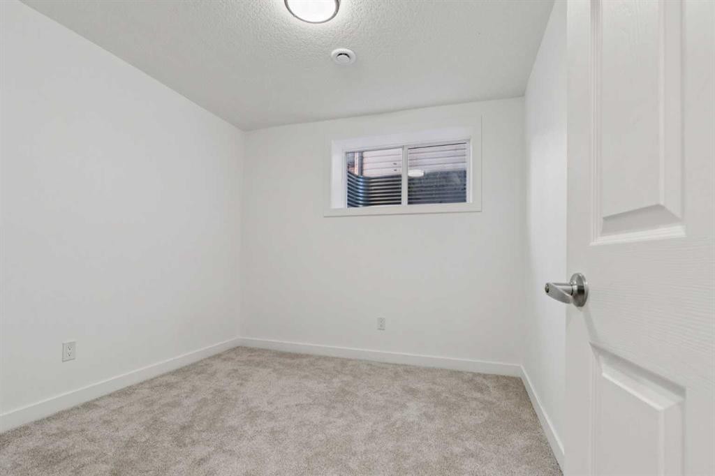 223 Carrington Circle Nw, Calgary, AB - Indoor Photo Showing Other Room