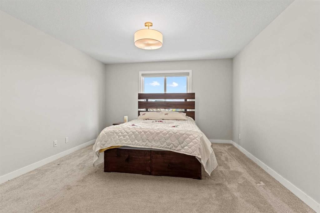283 Belvedere Drive Se, Calgary, AB - Indoor Photo Showing Bedroom