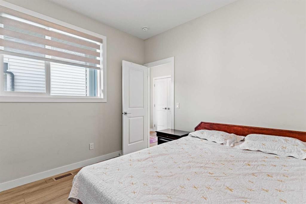 283 Belvedere Drive Se, Calgary, AB - Indoor Photo Showing Bedroom
