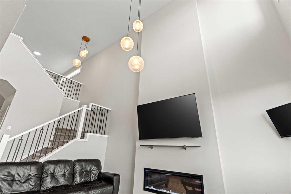283 Belvedere Drive Se, Calgary, AB - Indoor With Fireplace