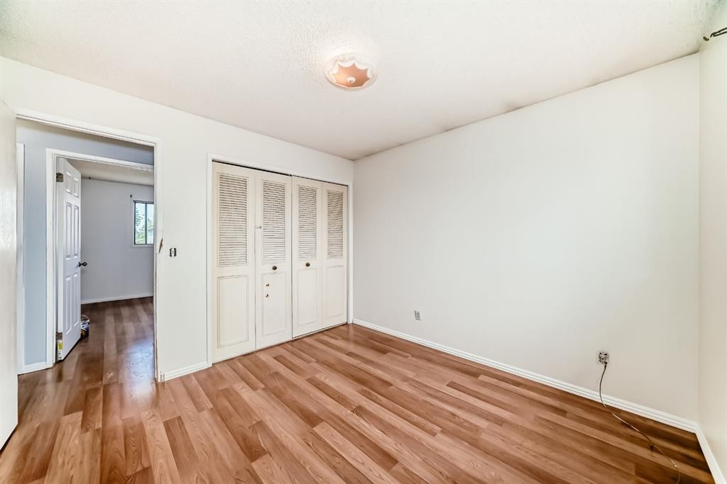 411 Abadan Place Ne, Calgary, AB - Indoor Photo Showing Other Room