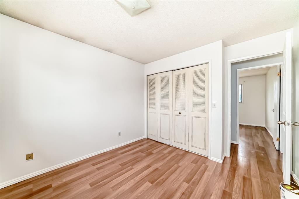 411 Abadan Place Ne, Calgary, AB - Indoor Photo Showing Other Room