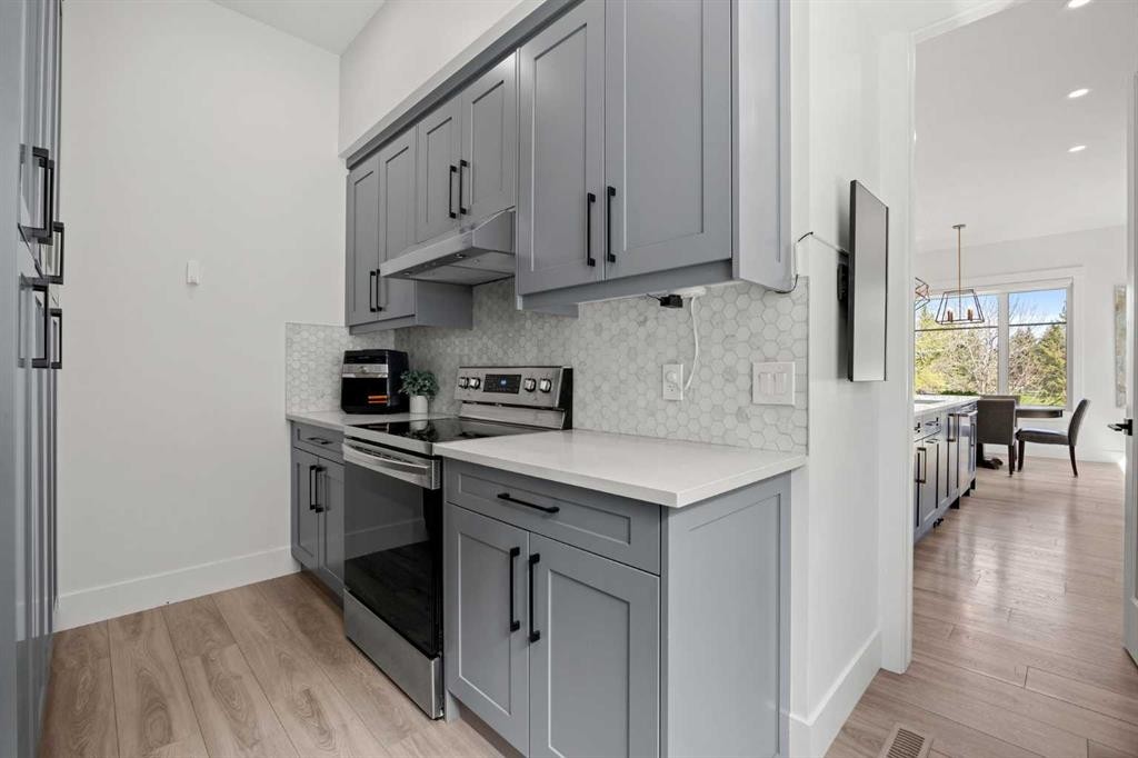 127 Kinniburgh Crescent, Chestermere, AB - Indoor Photo Showing Kitchen