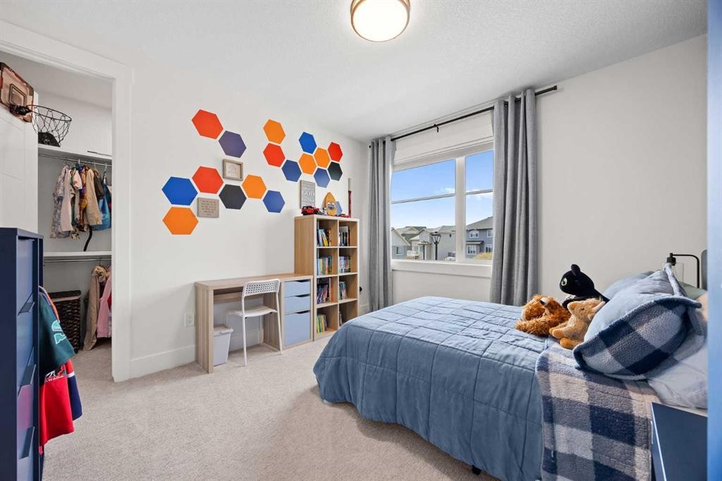 127 Kinniburgh Crescent, Chestermere, AB - Indoor Photo Showing Bedroom