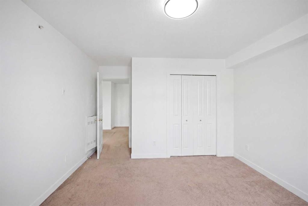 1408-6118 80 Avenue Ne, Calgary, AB - Indoor Photo Showing Other Room