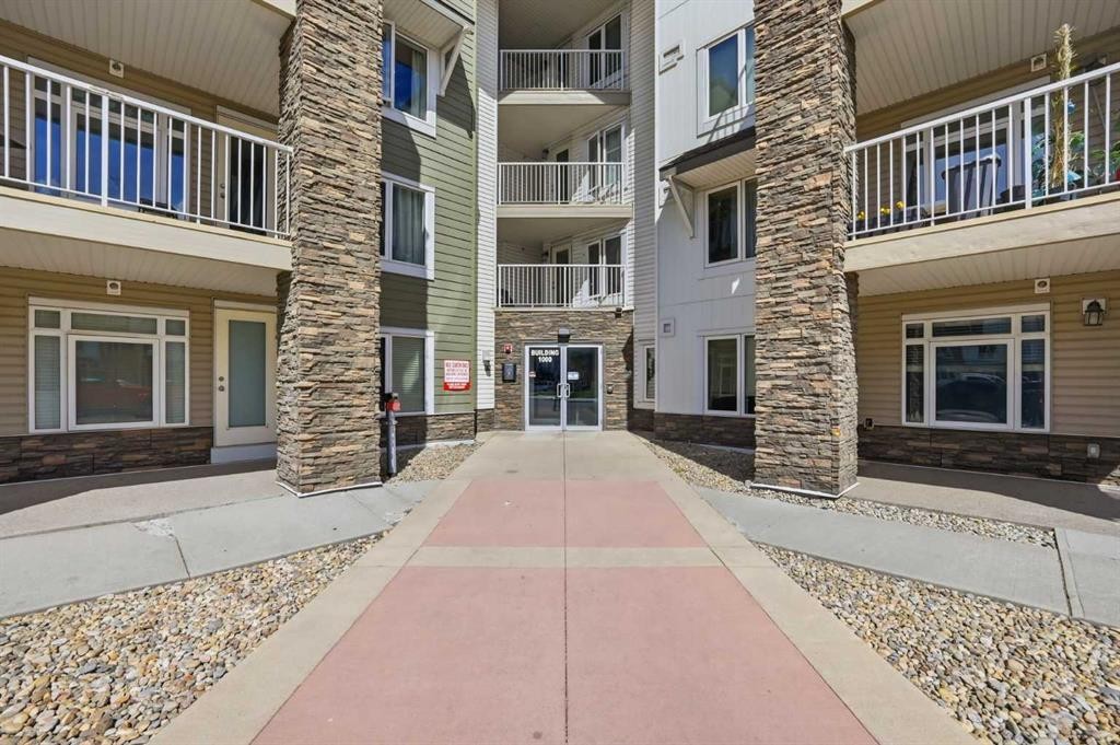 1408-6118 80 Avenue Ne, Calgary, AB - Outdoor With Balcony With Facade