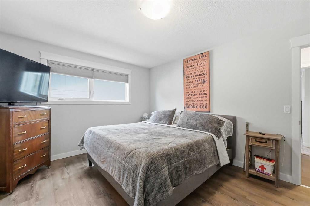 2406 26 Street, Nanton, AB - Indoor Photo Showing Bedroom