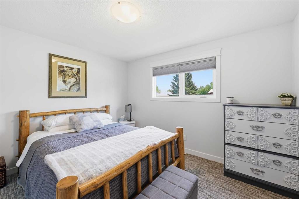 2406 26 Street, Nanton, AB - Indoor Photo Showing Bedroom