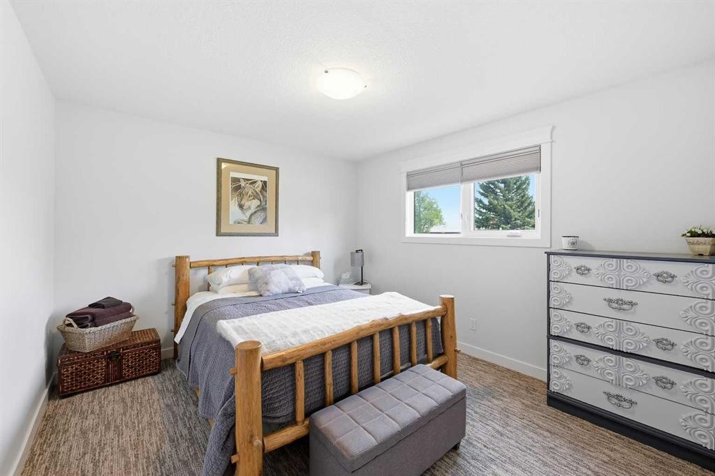 2406 26 Street, Nanton, AB - Indoor Photo Showing Bedroom