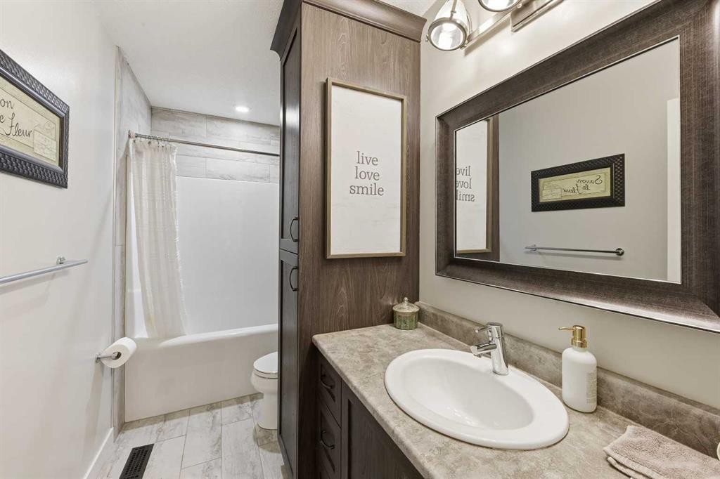 2406 26 Street, Nanton, AB - Indoor Photo Showing Bathroom