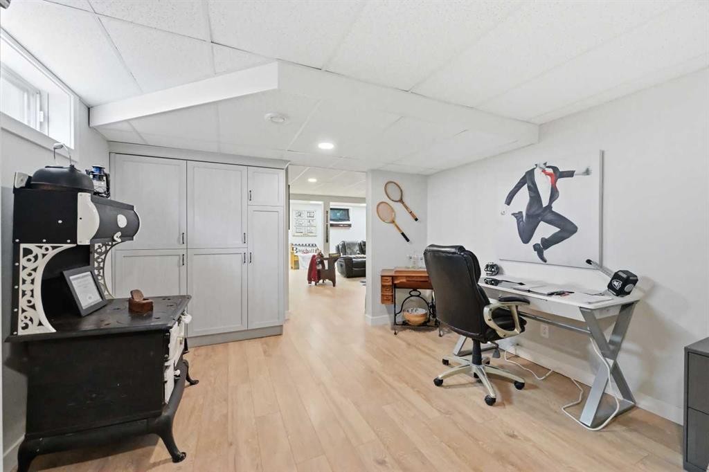 2406 26 Street, Nanton, AB - Indoor Photo Showing Gym Room