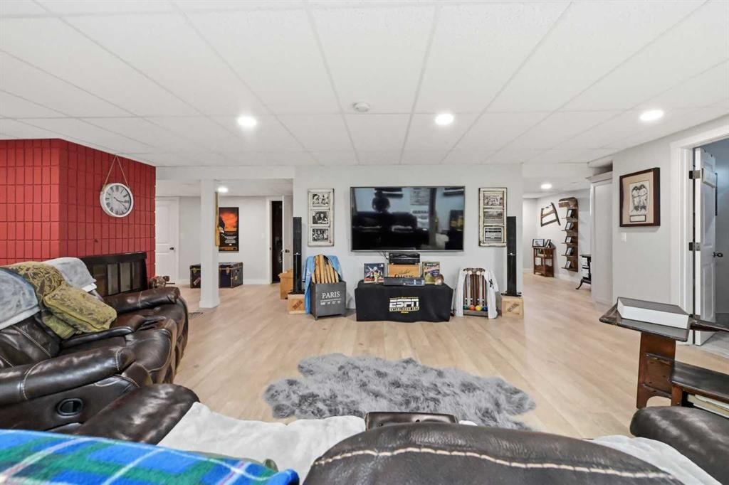 2406 26 Street, Nanton, AB - Indoor Photo Showing Living Room
