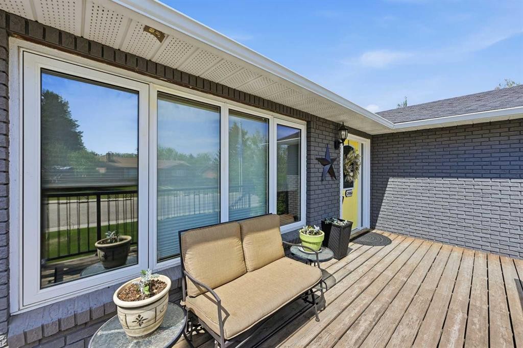 2406 26 Street, Nanton, AB - Outdoor With Deck Patio Veranda With Exterior