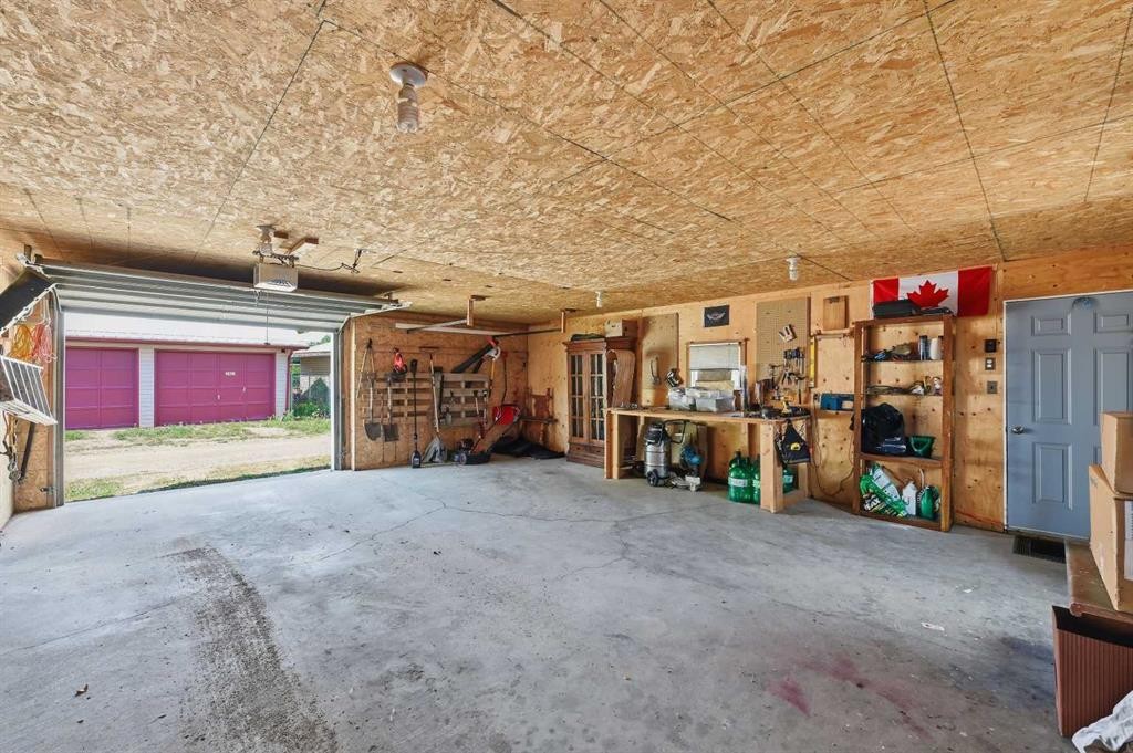 2406 26 Street, Nanton, AB - Indoor Photo Showing Garage