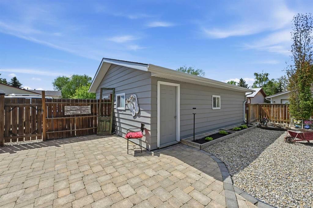 2406 26 Street, Nanton, AB - Outdoor With Exterior