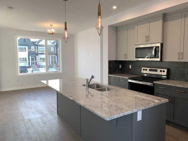 139 Ambleridge Street Nw, Calgary, AB - Indoor Photo Showing Kitchen With Double Sink With Upgraded Kitchen