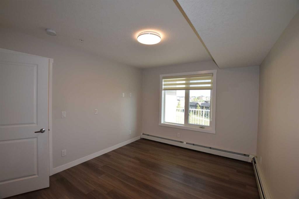 2318-6118 80 Avenue Ne, Calgary, AB - Indoor Photo Showing Other Room