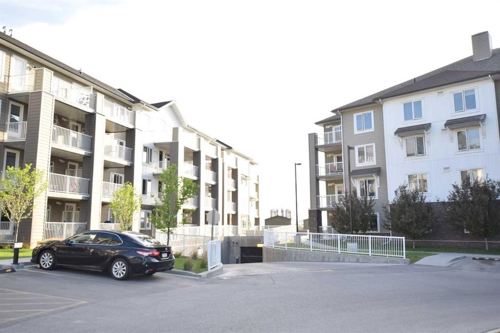 2318-6118 80 Avenue Ne, Calgary, AB - Outdoor With Balcony With Facade