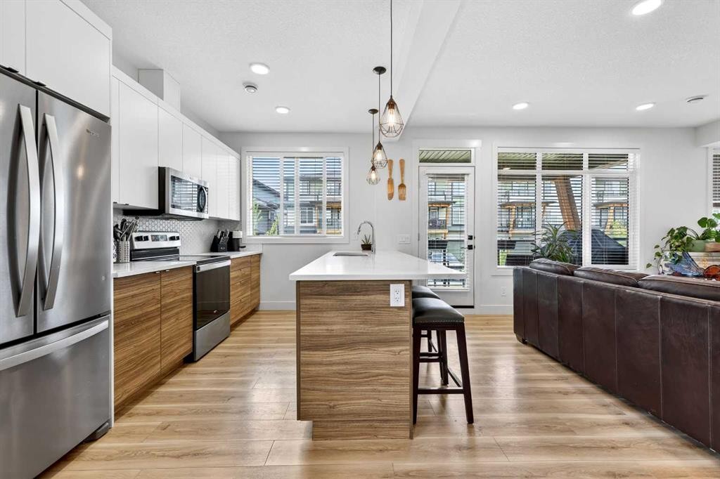 33-230 Seton Passage Se, Calgary, AB - Indoor Photo Showing Kitchen With Stainless Steel Kitchen