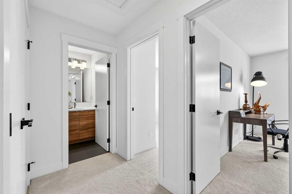 33-230 Seton Passage Se, Calgary, AB - Indoor Photo Showing Other Room
