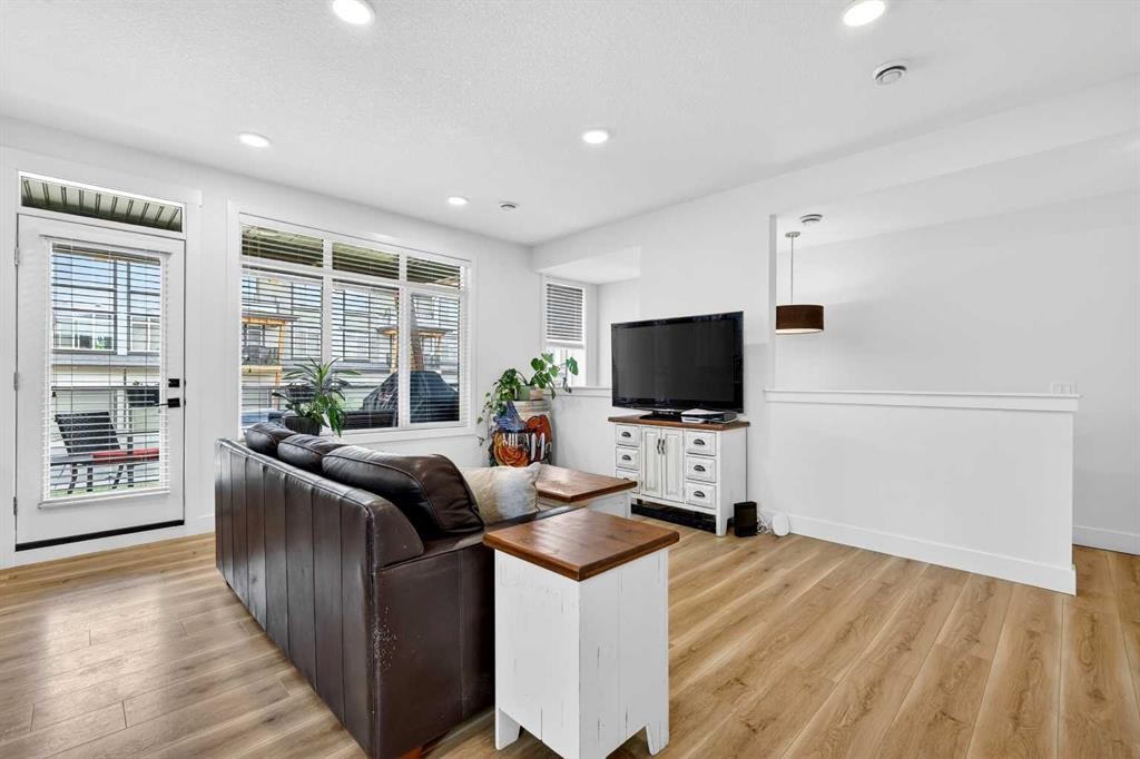 33-230 Seton Passage Se, Calgary, AB - Indoor Photo Showing Living Room