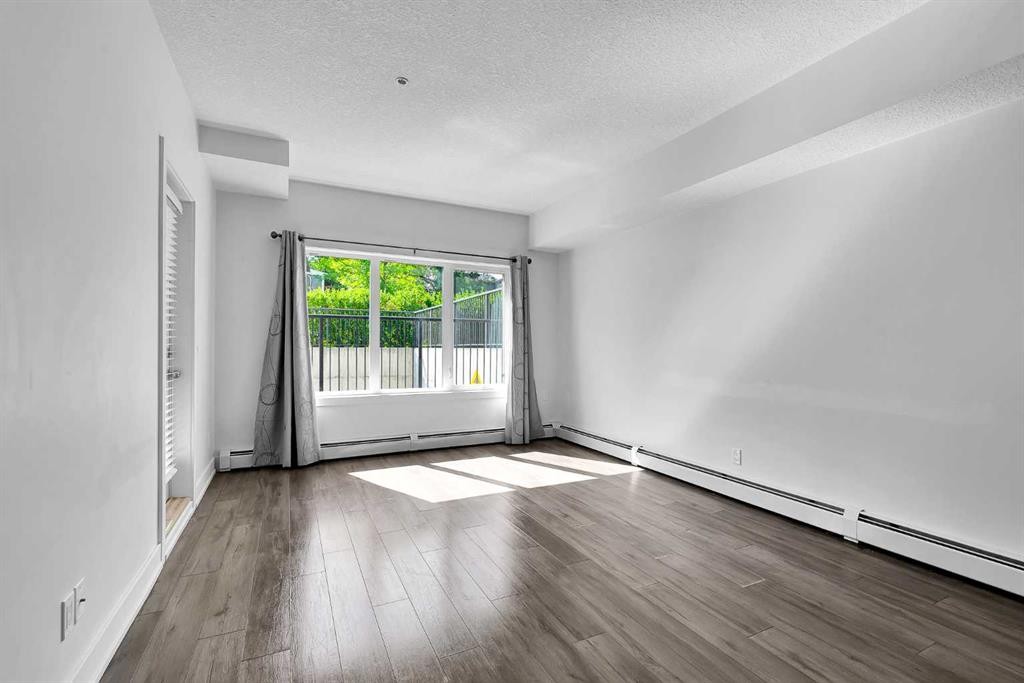 107-611 Edmonton Trail Ne, Calgary, AB - Indoor Photo Showing Other Room