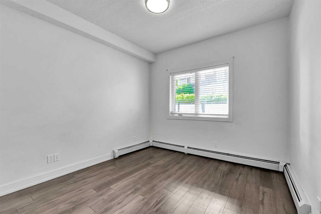 107-611 Edmonton Trail Ne, Calgary, AB - Indoor Photo Showing Other Room