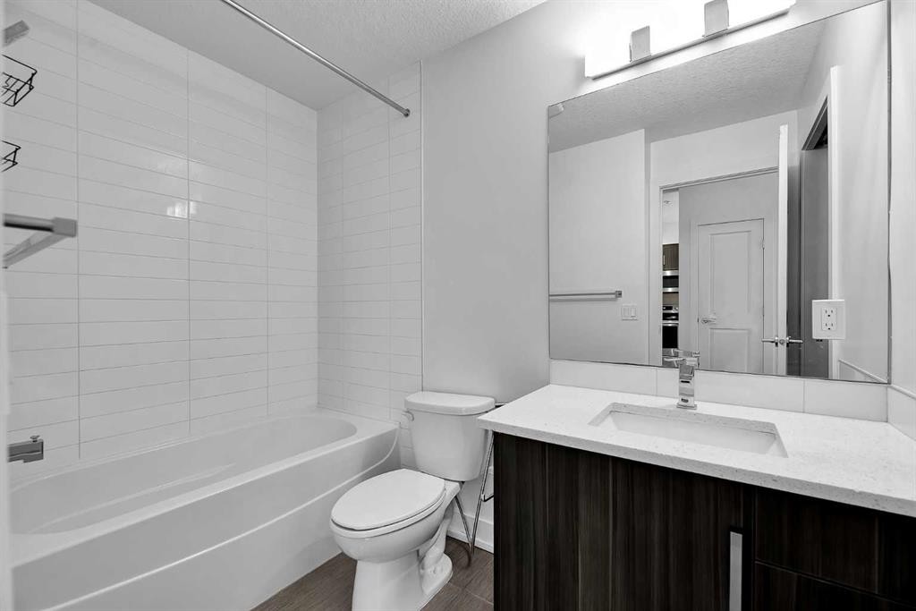 107-611 Edmonton Trail Ne, Calgary, AB - Indoor Photo Showing Laundry Room