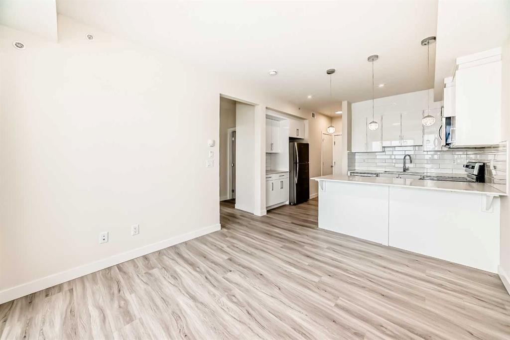 2406-15 Skyview Point Crescent, Calgary, AB - Indoor Photo Showing Kitchen With Double Sink