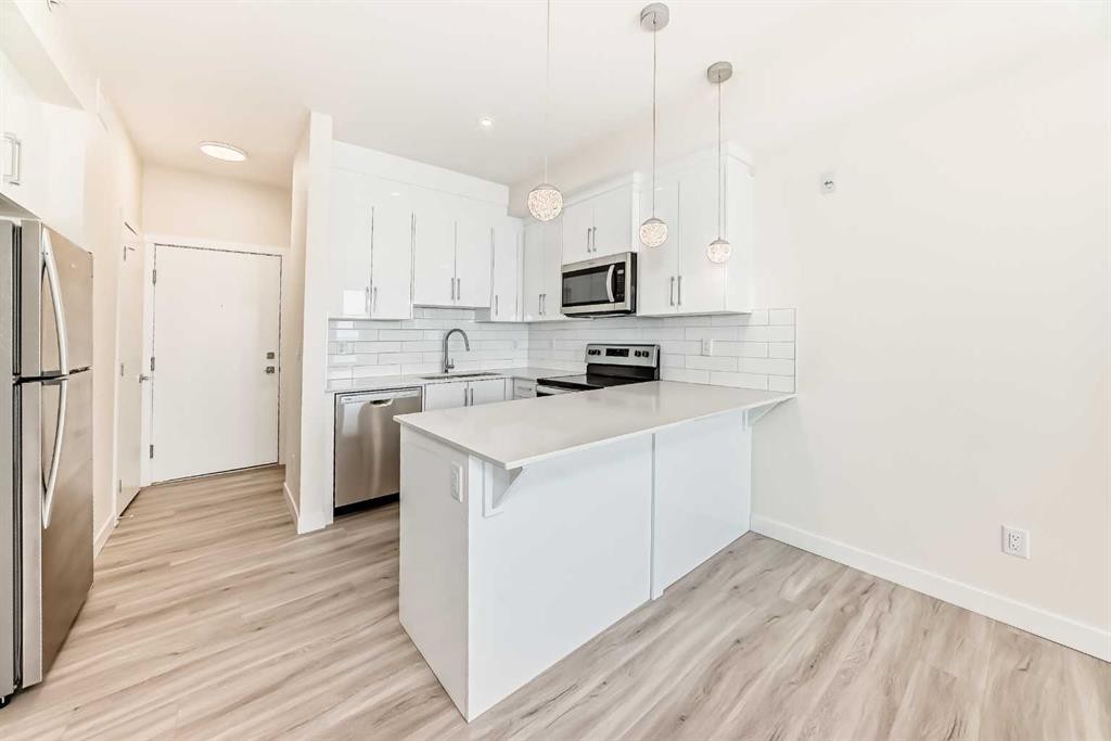 2406-15 Skyview Point Crescent, Calgary, AB - Indoor Photo Showing Kitchen With Stainless Steel Kitchen With Upgraded Kitchen