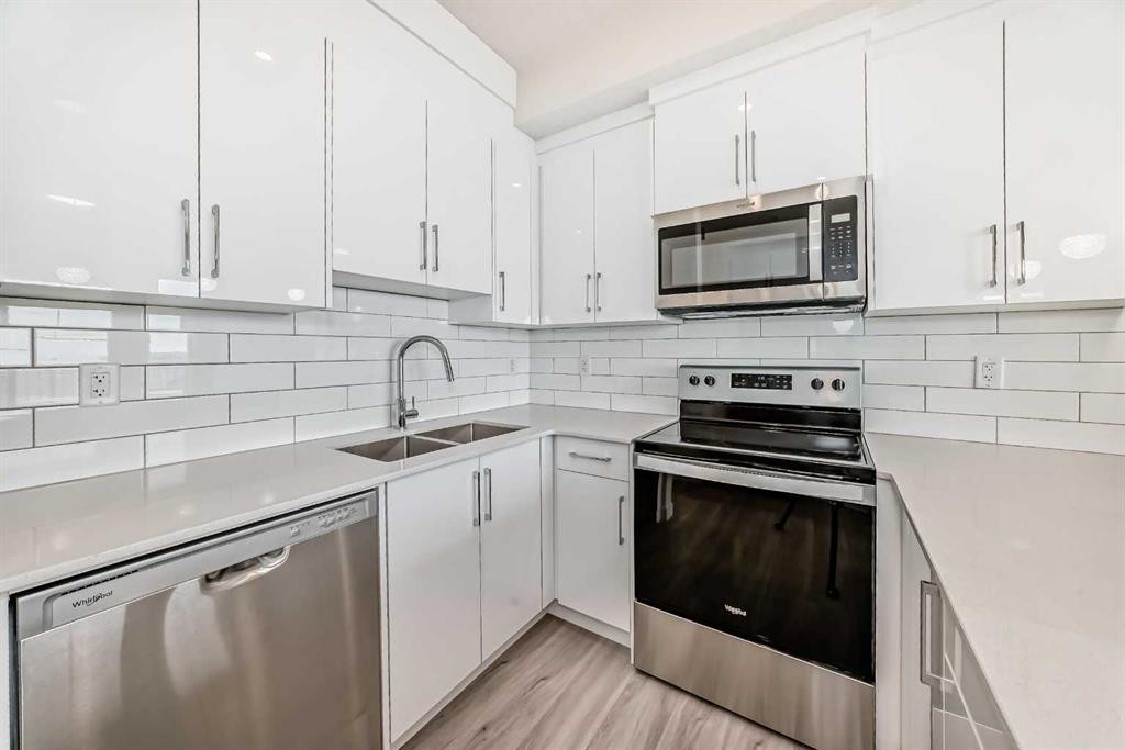 2406-15 Skyview Point Crescent, Calgary, AB - Indoor Photo Showing Kitchen With Stainless Steel Kitchen With Double Sink With Upgraded Kitchen
