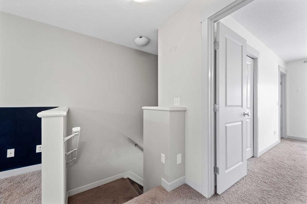 140 Cascades Pass, Chestermere, AB - Indoor Photo Showing Other Room
