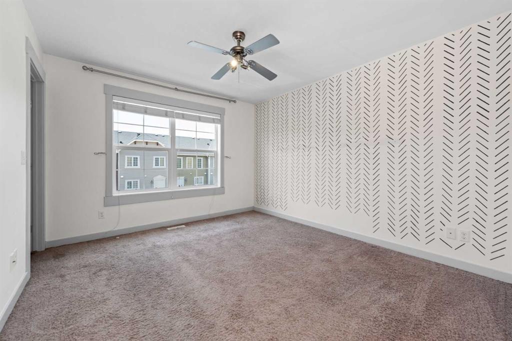140 Cascades Pass, Chestermere, AB - Indoor Photo Showing Other Room