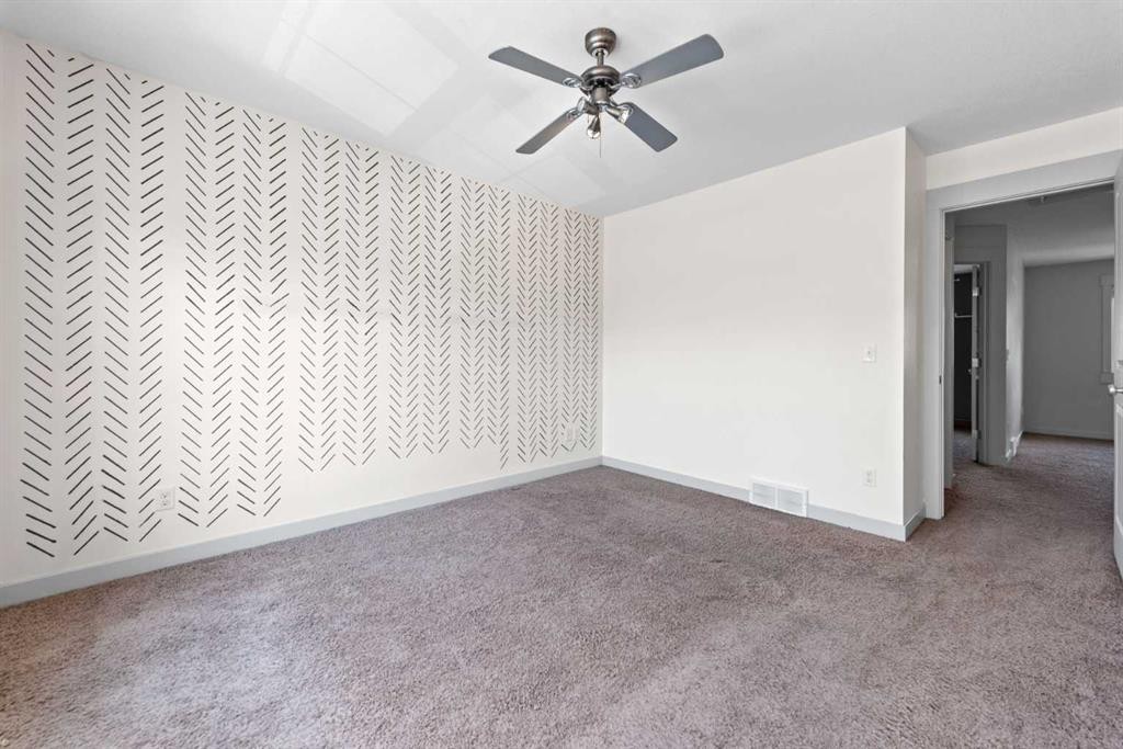 140 Cascades Pass, Chestermere, AB - Indoor Photo Showing Other Room
