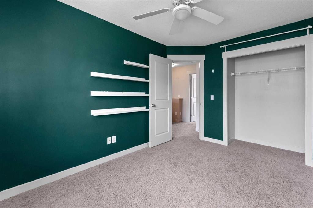 140 Cascades Pass, Chestermere, AB - Indoor Photo Showing Other Room