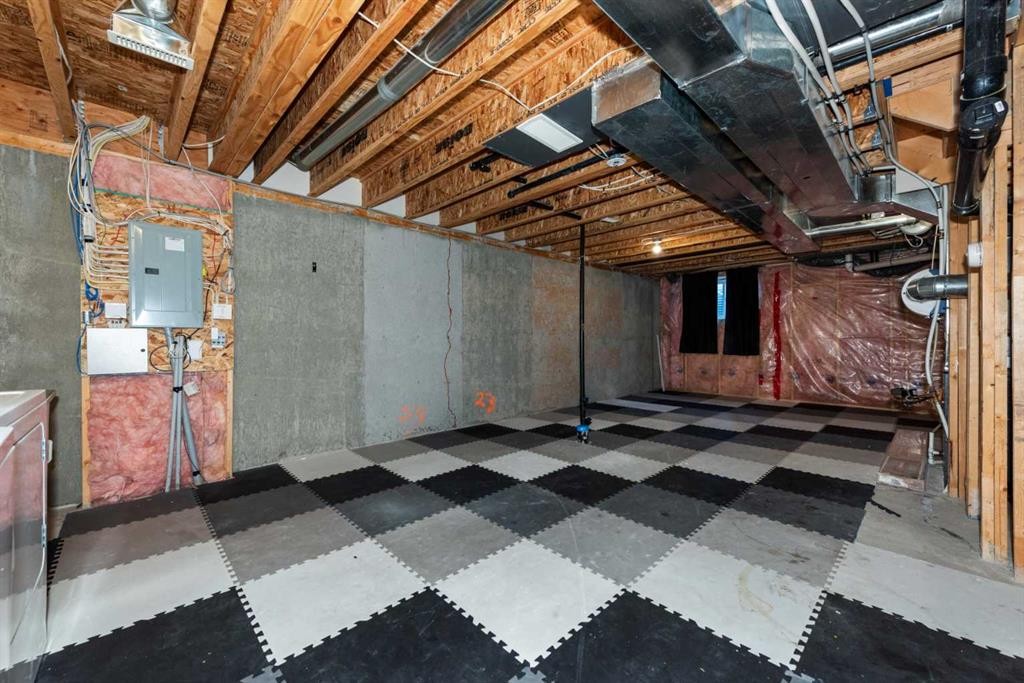 140 Cascades Pass, Chestermere, AB - Indoor Photo Showing Basement