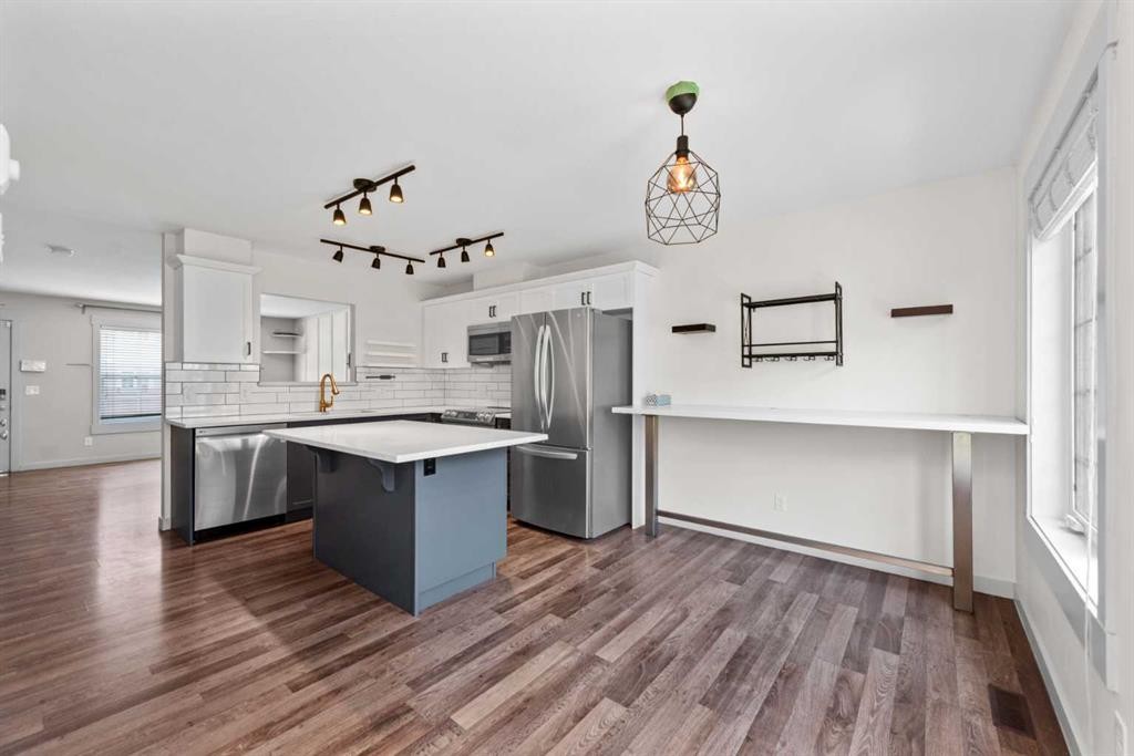 140 Cascades Pass, Chestermere, AB - Indoor Photo Showing Kitchen With Upgraded Kitchen