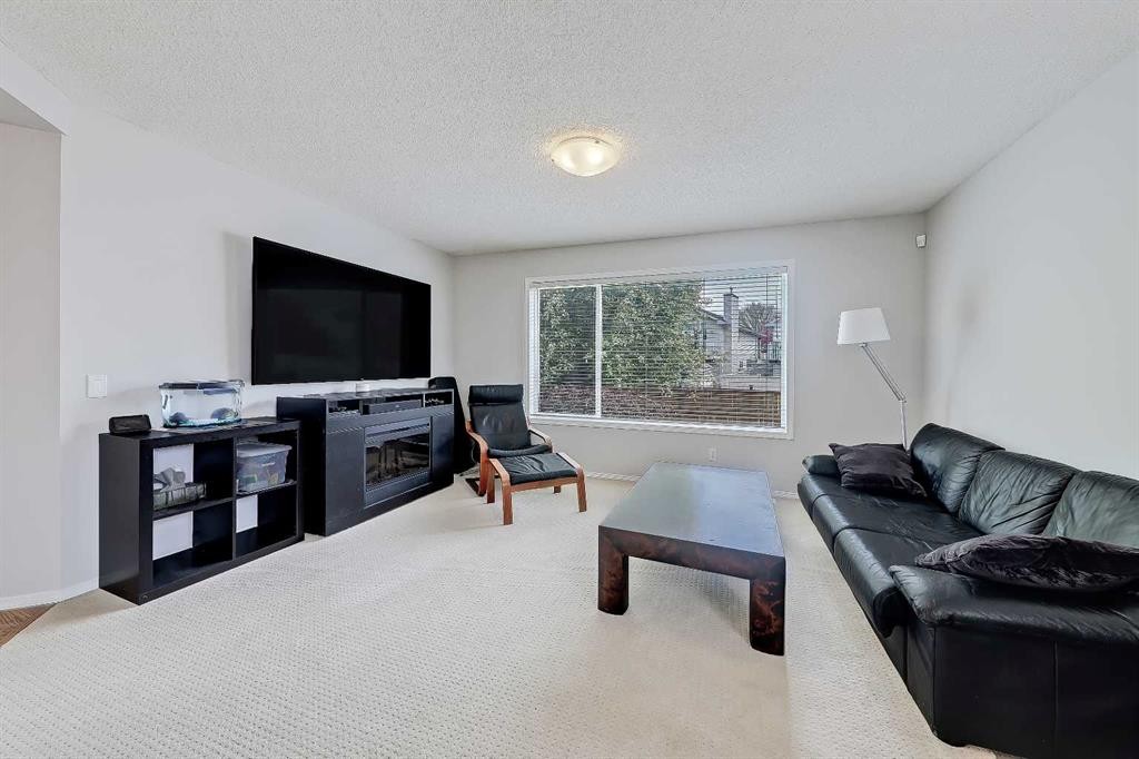 36 Mt Selkirk Close Se, Calgary, AB - Indoor Photo Showing Living Room