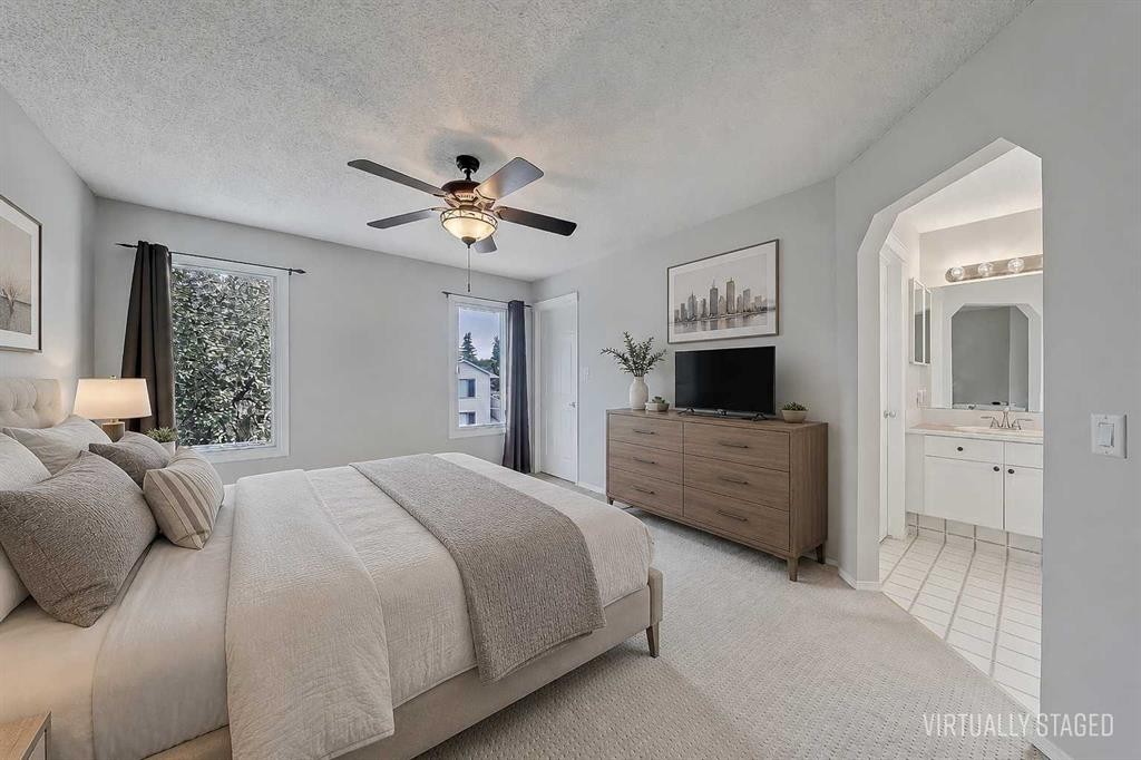 36 Mt Selkirk Close Se, Calgary, AB - Indoor Photo Showing Bedroom