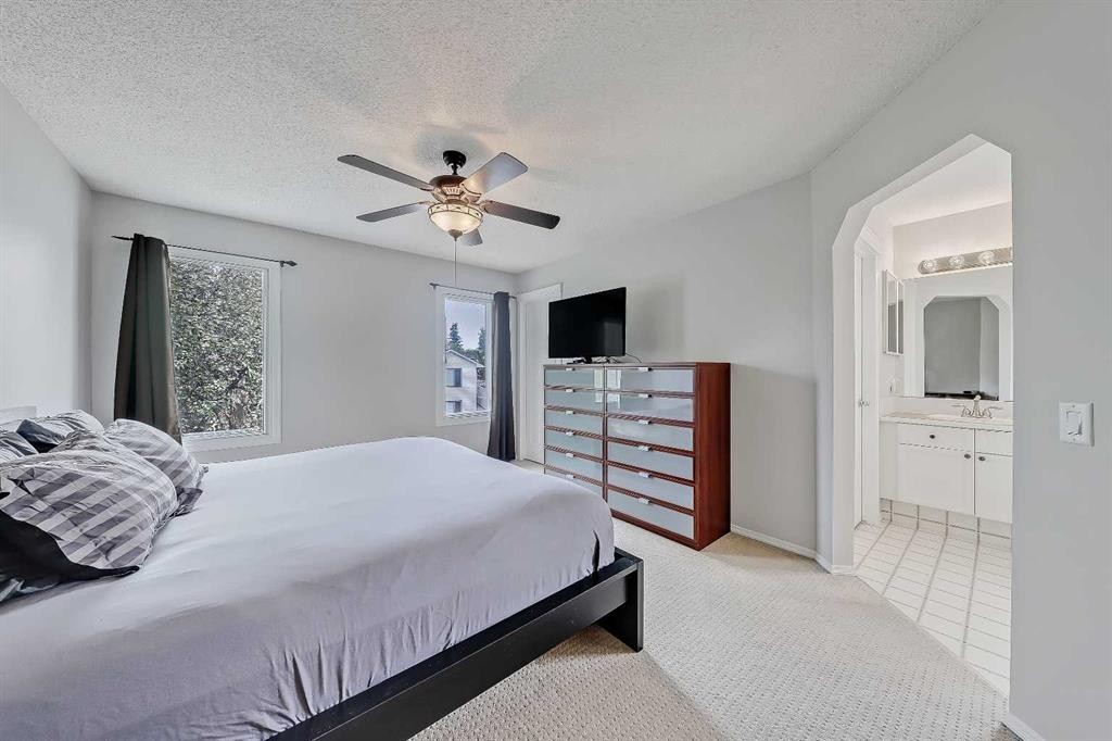 36 Mt Selkirk Close Se, Calgary, AB - Indoor Photo Showing Bedroom