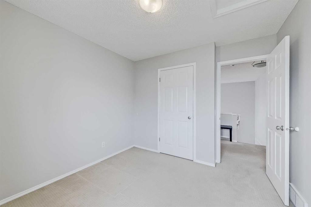 36 Mt Selkirk Close Se, Calgary, AB - Indoor Photo Showing Other Room