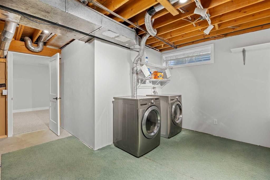 260 Riverside Mews Se, Calgary, AB - Indoor Photo Showing Laundry Room